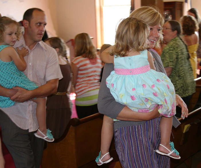 Showing Lilly off to the Church